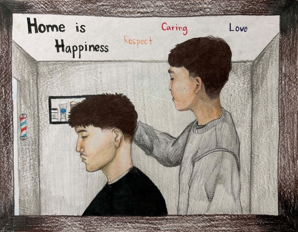 2026 What Home Means to Me winner. A barber cutting another mans hair in a barbershop. Home is Respect. Caring. Love.