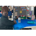 A man sitting at a table with information about the Housing Choice Voucher Program.