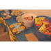 Assorted prizes and candy on a table.